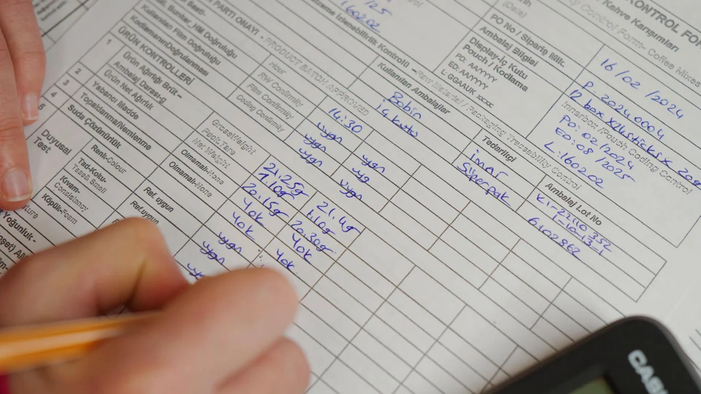 A production control record being completed